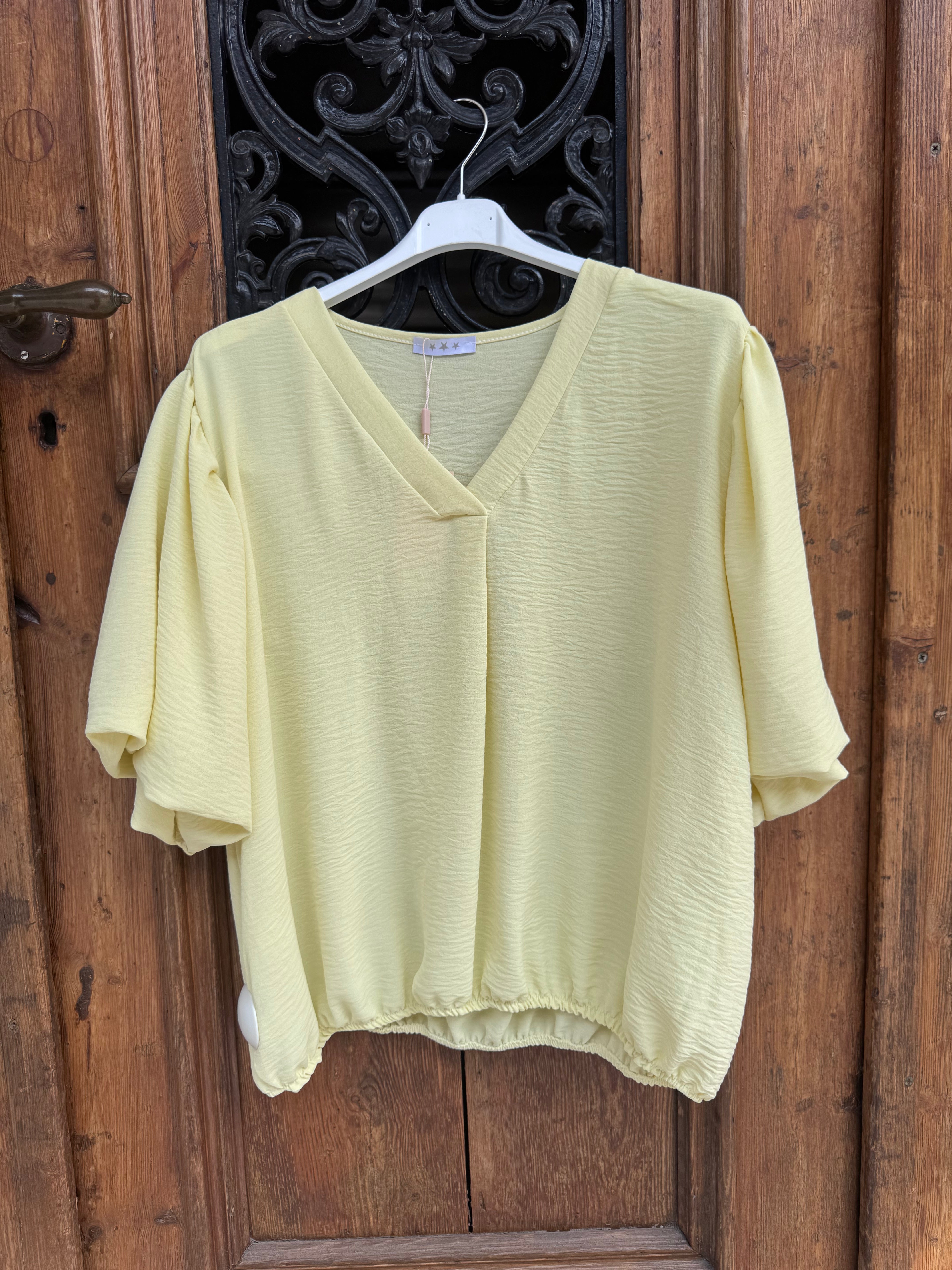 Caramelle V-ringad blus