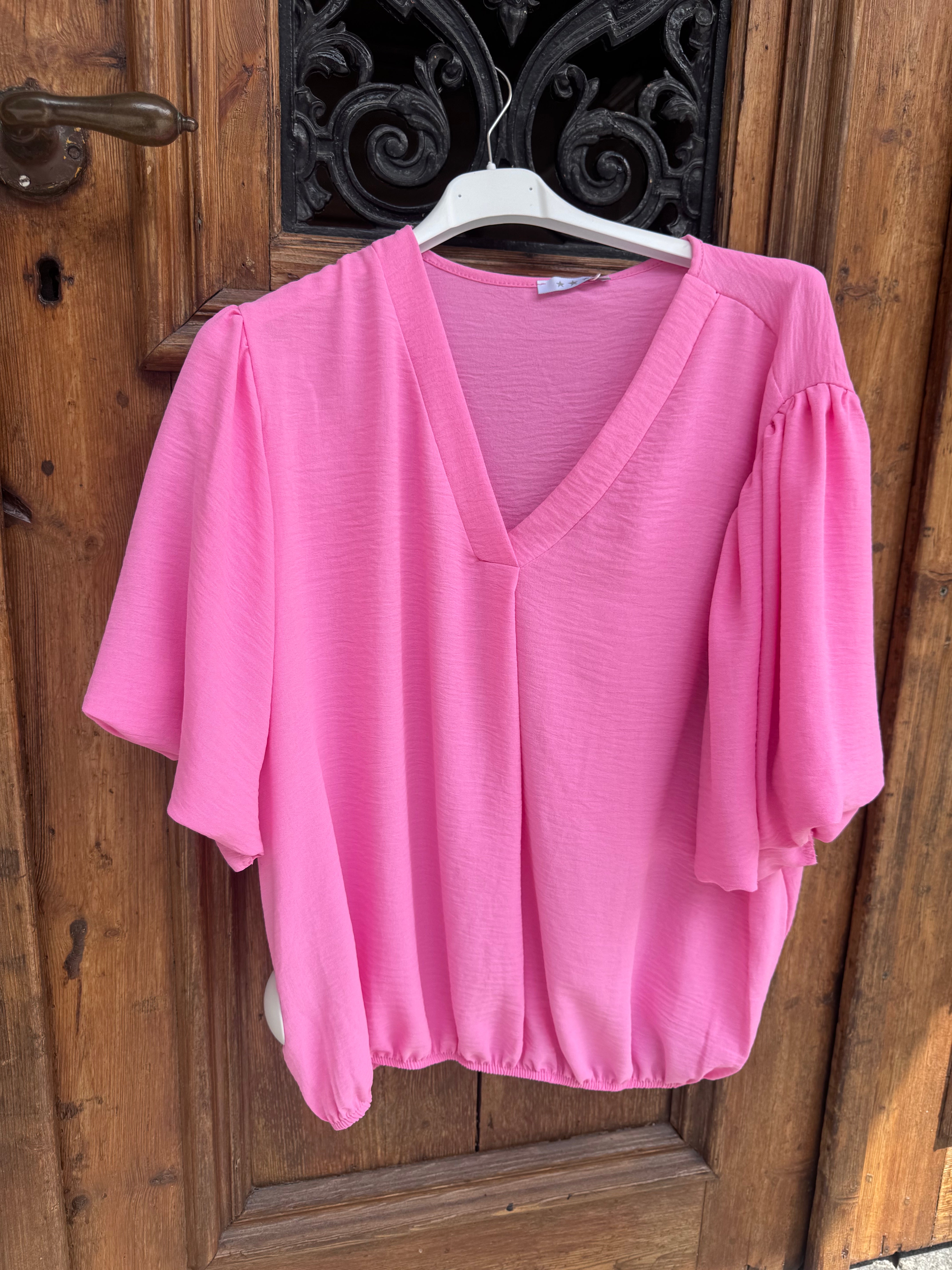 Caramelle V-ringad blus